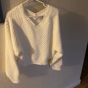 Selling a white cropped sweater fashion nova